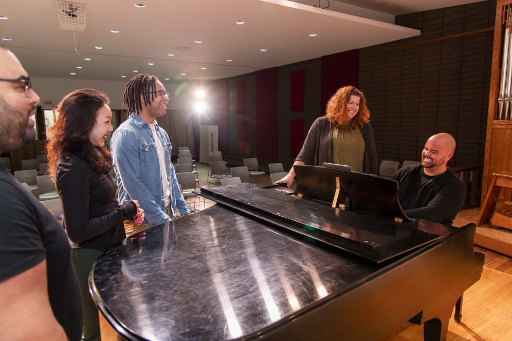 Master of Music students and faculty rehearse in the Recital Hall.