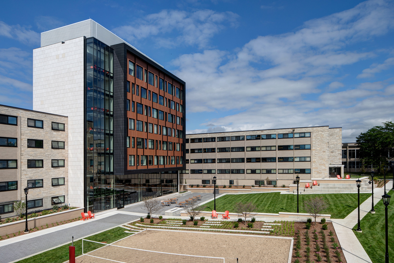 The Tower Terrace includes an outdoor seating area and volleyball court.