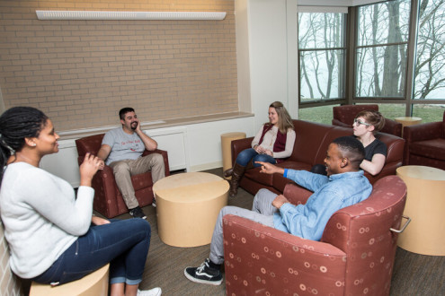 Students hang out in the Oaks.