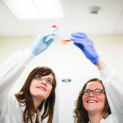 Prof. Andrea Henle performs research with a student