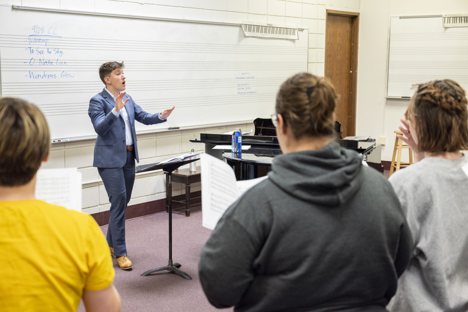 Professor Maggie Burk (music) and the Carthage Choir.