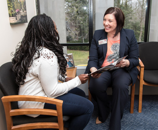 Admissions counselor Ashley Hanson meets with a student.