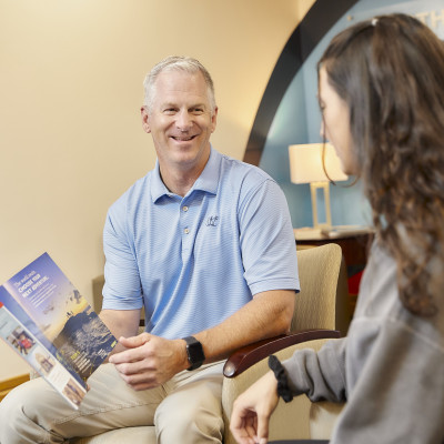 Admissions counselor Greg Huss works with a prospective student.