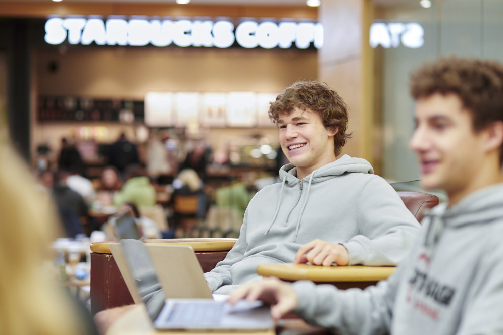 Students hang out in Starbucks between classes. 