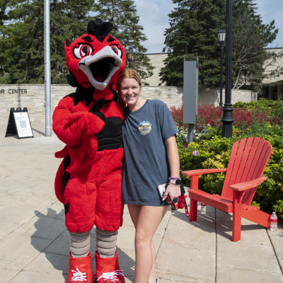Ember with a student at Arrival & Move-In.