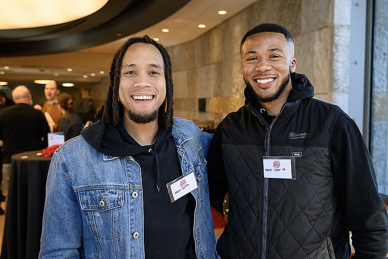 Carthage alumni pose for a photo