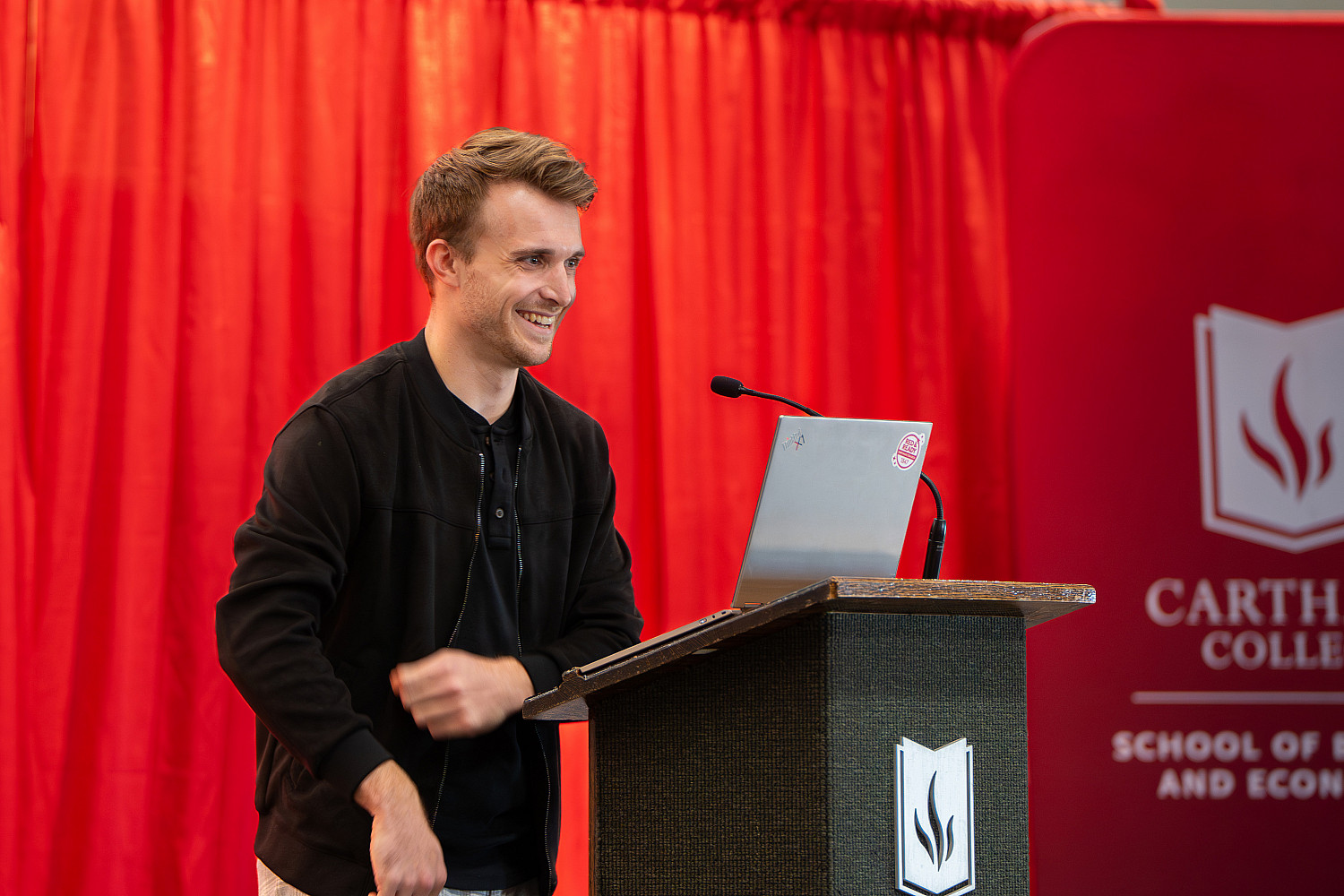 Carthage graduate Ben Livicki '21 speaks to students.
