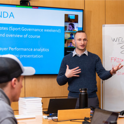 Prof. Carter Rockhill teaching a sports management course.