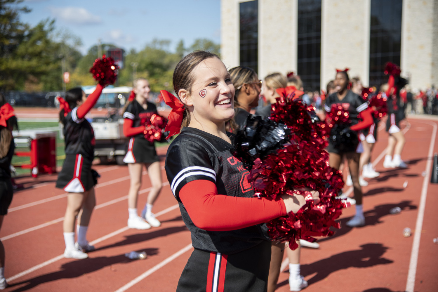 The Carthage Spirit Team cheers on the Firebirds.