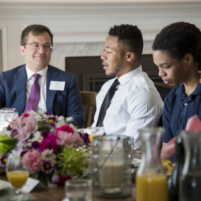 Members of the My Brother's Keeper student organization at Carthage met with President John Swallow for dinner at his house.